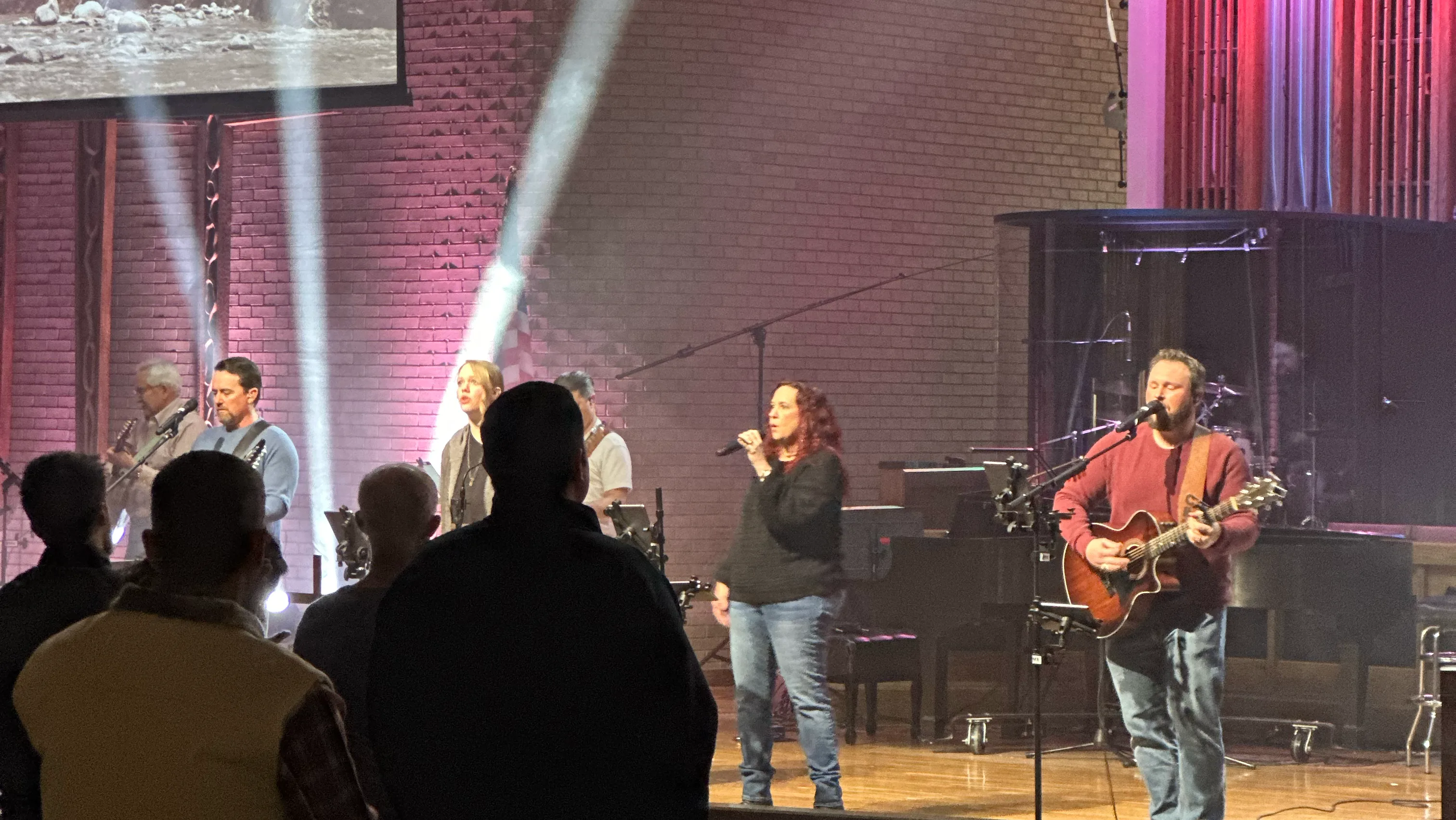 IMG_0003 a child is drawing on a piece of paper