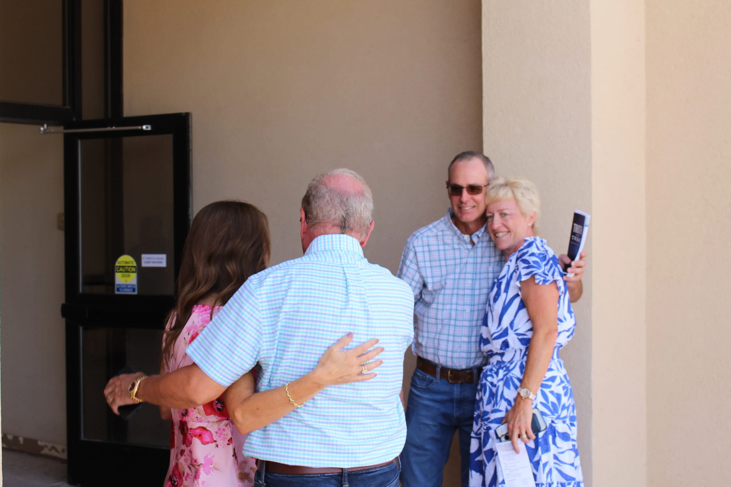 fmc033 three men and laughing two women walking side by side